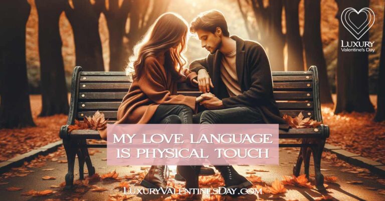My Love Language is Physical Touch: Couple holding hands on a park bench surrounded by autumn leaves. | Luxury Valentine's Day